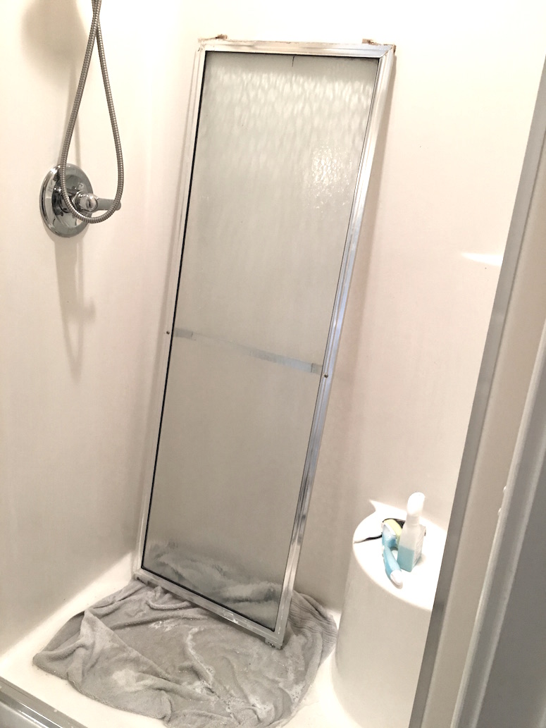 Removing shower doors for deep cleaning