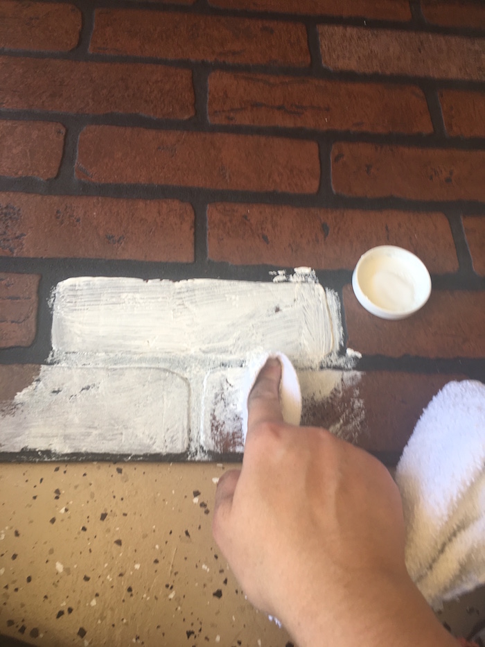 Painting faux brick panel
